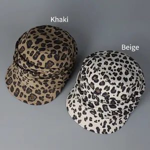Fashionable leopard print bucket hats in khaki and beige tones shown from a 45-degree angle