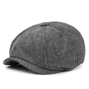 Classic herringbone newsboy cap for men in vintage black and white woven fabric