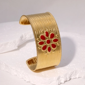 18k gold plated stainless steel cuff bracelet with sun symbol and red enamel flower