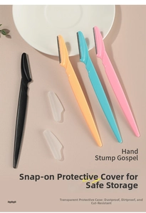 Detail of eyebrow razors with serrated safety guards and transparent protective caps