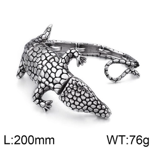 Detail of vintage silver crocodile bracelet showing scale texture, 200mm length and 76g weight