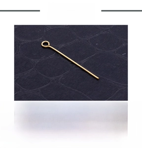 Detailed view of golden stainless steel eye pins for DIY earring jewelry making