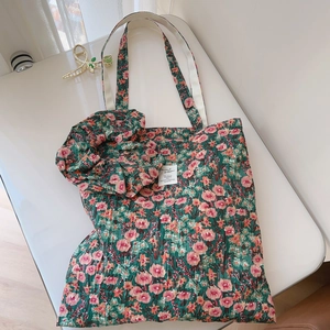 Floral print cotton tote bag with matching hair scrunchie in deep green vintage style