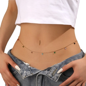 Minimalist gold stainless steel waist chain with multicolor gemstones on a model