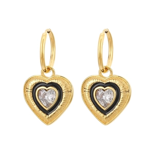 Vintage gold plated heart earrings with black enamel inlay and sparkling rhinestone