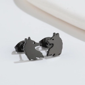 Detailed view of matte black wolf head stud earrings on a clean white background