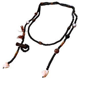 Bohemian beaded necklace with tiger eye glass, bamboo tube, pearls, and shell pendant