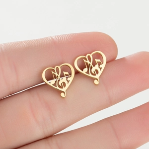 Minimalist gold heart stud earrings with musical note design in polished stainless steel