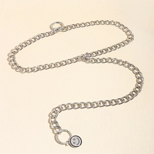Detail of silver star waist chain featuring a metal ring and engraved NOHO ONTO charm