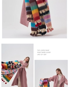 Close-up detail of colorful striped scarf featuring soft fringe and fluffy pom-pom accents