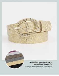 Detail showing various colors of glitter belts with oval buckles and sequined texture