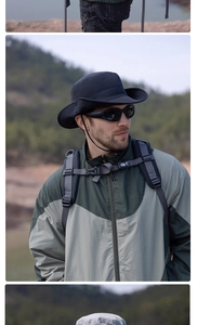 Detail of black waterproof sun hat with adjustable chin strap for outdoor activities