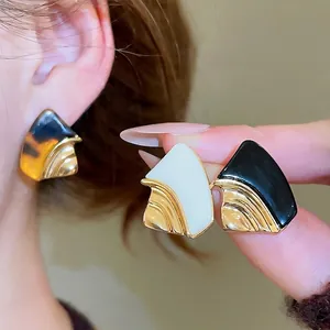 18k gold plated geometric resin stud earrings with abstract design in classic colors