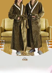 Detail of soft flannel bathrobe with shawl collar and contrasting white piping accents