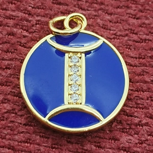 Ciondolo vintage Gemelli in oro con smalto blu e dettagli in cristalli luccicanti