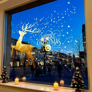 Golden Christmas reindeer window stickers with Merry Christmas greeting for shop decor