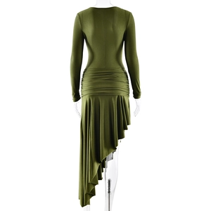 Detail of the gathered waist and asymmetric hem on a slim-fit dark green maxi dress