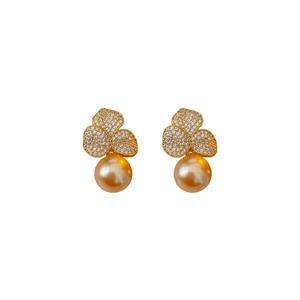 Elegant gold plated clover stud earrings with sparkling cubic zirconia and golden pearls
