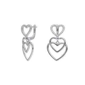Detailed macro shot of S925 sterling silver nested heart earrings with zircon accents