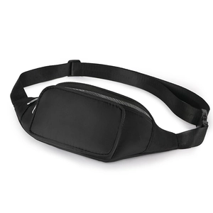 Detail of high-density black nylon fabric texture and polished silver metal zipper closure