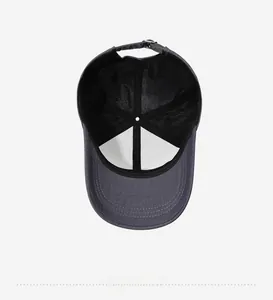 Detail view of the inner lining and stitching of a classic grey baseball cap for men