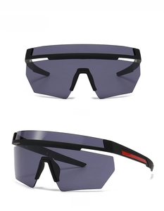 Front and side view of black oversized one-piece wrap-around vintage sports sunglasses