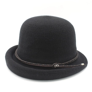 Women's black knit sun hat with brown braided leather band and silver buckle