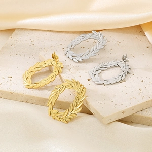 Elegant 18k gold and silver stainless steel leaf-shaped hoop earrings on stone base