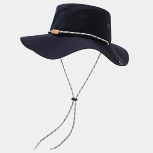 Detail of navy waterproof hiking hat featuring breathable metal vents and adjustable wind cord