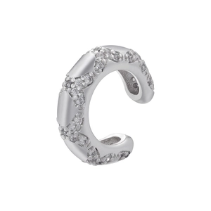 Detailed close-up of a silver C-shaped ear cuff with butterfly-patterned sparkling zircons