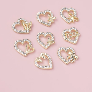 8pcs gold heart-shaped nail charms with rhinestones, butterflies and LOVE designs