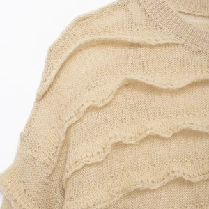 Beige loose knit sweater with layered ruffle trim and breathable crochet texture