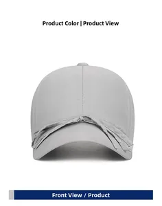 Detail of light gray baseball cap featuring a bow ribbon and breathable fabric texture