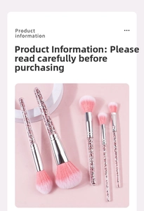 Detail of 5-piece makeup brush set with pink glitter handles and soft gradient bristles