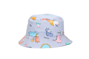 Detail of baby sun hat featuring blue cotton fabric and cartoon dinosaur print patterns
