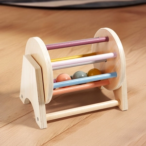 Montessori wooden spinning drum toy with colorful rods for early childhood sensory learning