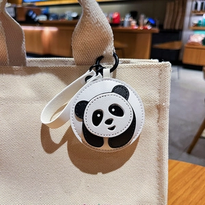 Cute leather panda keychain on canvas bag with premium black metal clasp and stitching