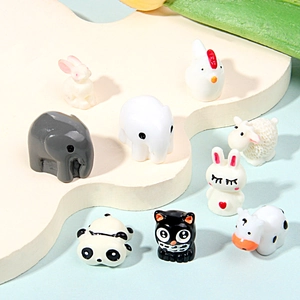 Set of 9 resin miniature animals including panda and cow for garden decor and DIY crafts