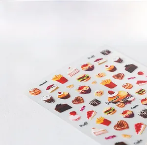 Detailed 5D nail art stickers featuring miniature cakes, waffles, and food dessert patterns