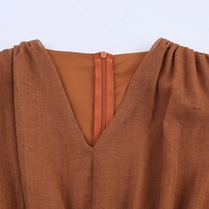 Brown V-neck long dress with back zipper detail and pleated texture for commuting