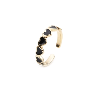 Detail of adjustable gold ring featuring a row of black enamel heart shapes