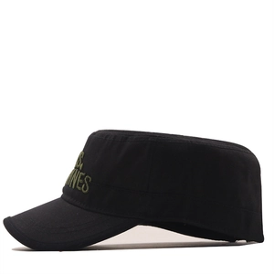 Detail of green U.S. MARINES embroidery on a black canvas military flat top hat