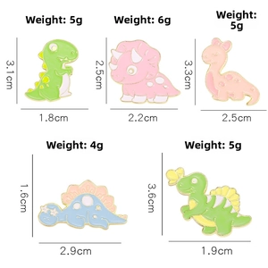 Detailed size and weight view of five colorful cartoon dinosaur enamel pins in alloy