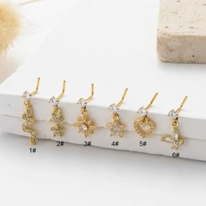 Golden stainless steel L-shaped nose studs set with zircon charms in six various shapes