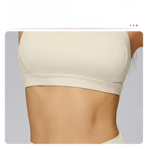 Detail view of the wide elastic hem on yoga bra for maximum support and anti-slip fit
