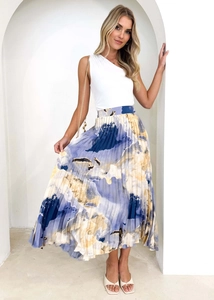 Detail of high-waisted pleated midi skirt with blue and yellow oil painting print texture