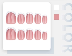 Detail of elegant French tips press-on nails set in nude pink and white gloss finish