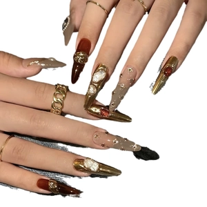 Baroque style extra long stiletto press-on nails with luxury gems and gold relief art