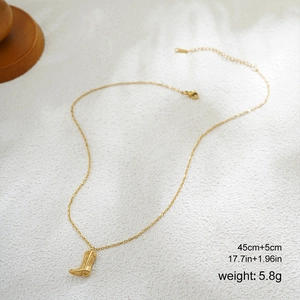Detail of 18K gold stainless steel cowboy boot pendant with size and weight parameters