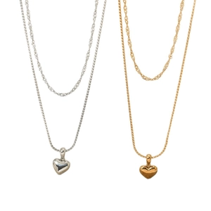 Collier double épaisseur avec pendentif cœur en acier inoxydable doré et argent